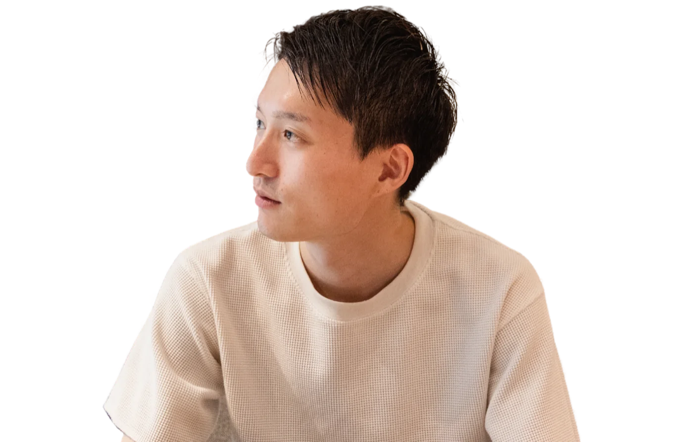 講師の三浦圭人（KEITO）が横を向いて話を聞いている写真